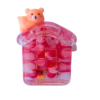 A vibrant red liquid-filled house keychain with floating beads, featuring a small bear figure on top, attached to a gold keyring with a bell.