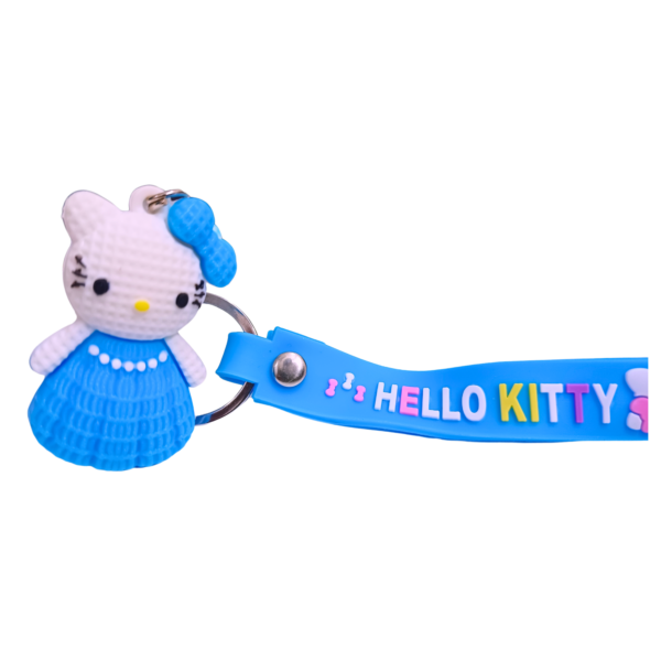 Hello Kitty keychain with a blue dress and a matching blue silicone strap.