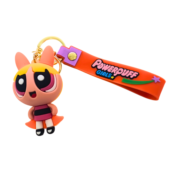 An orange Powerpuff Girls keychain featuring Blossom with her signature red bow, attached to an orange "Powerpuff Girls" silicone strap and a gold keyring.