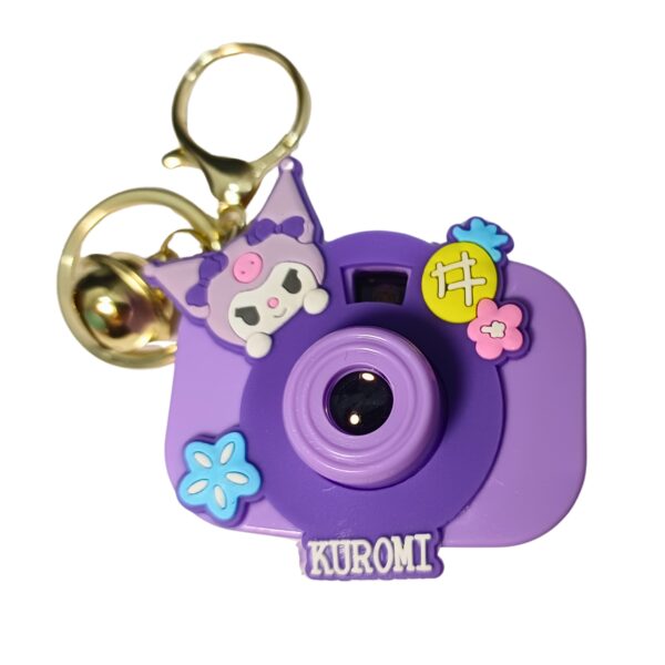 Adorable purple toy camera keychain featuring Kuromi and flower accents.