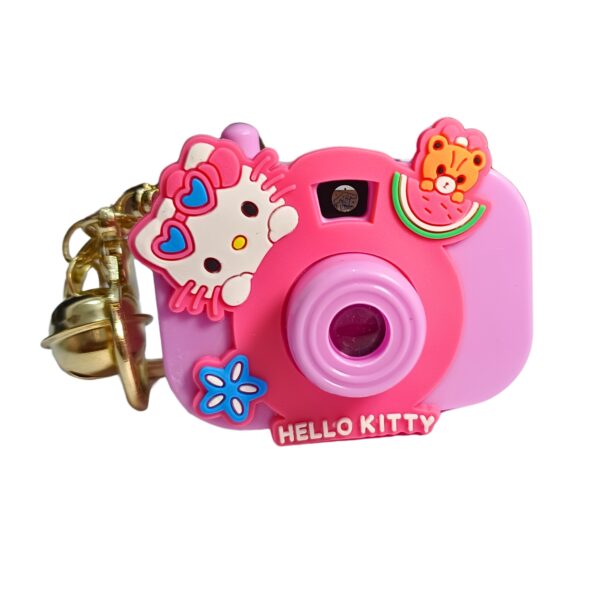 Cute pink toy camera keychain with Hello Kitty and watermelon charm.