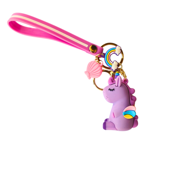 Adorable unicorn charm keychain with rainbow and shell accents, featuring a soft silicone unicorn figure.