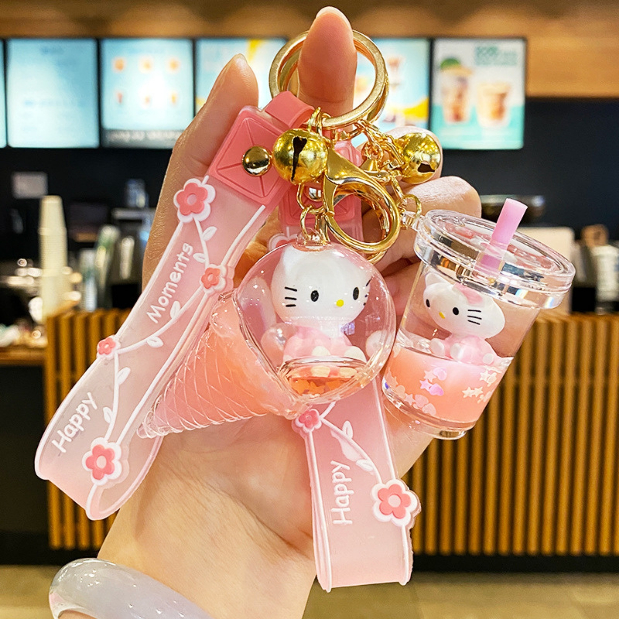 cute pink sipper and ice cream water glitter keychains with hello kitty charms and happy moments straps